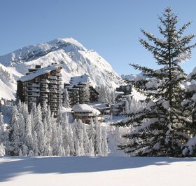 Snowy view of Avoriaz apartment blocks