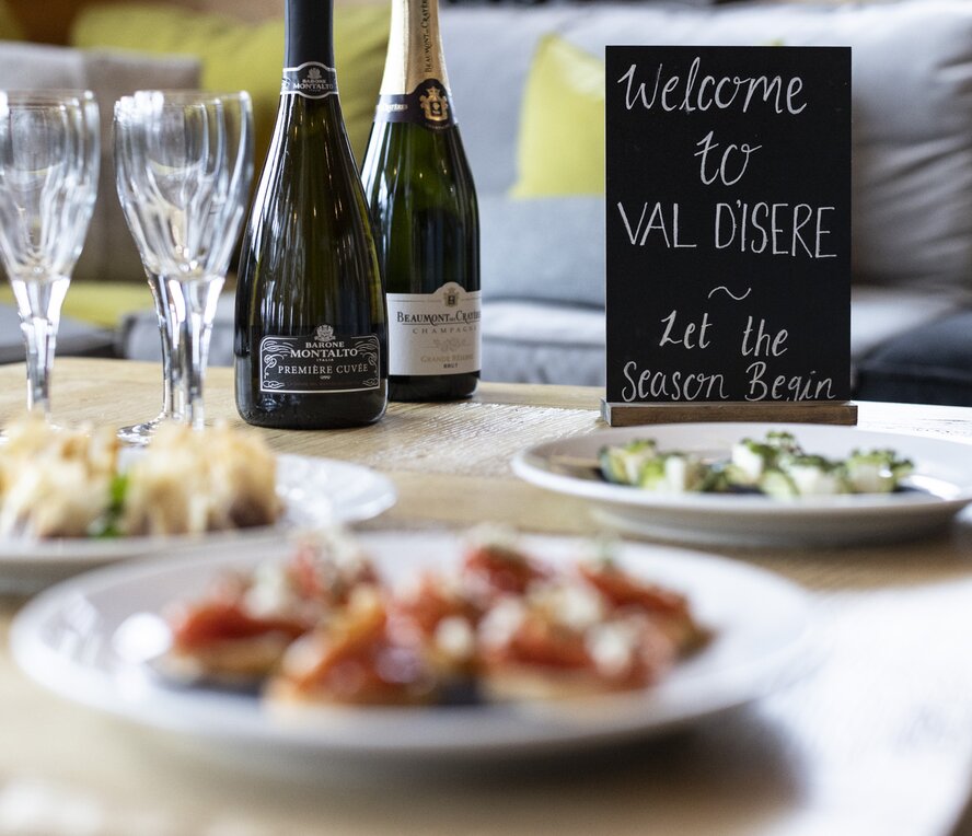 Champagne  and canapes on a chalet coffee table, No 1 Bellevarde, Val d'Isere