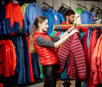lady selecting ski clothing