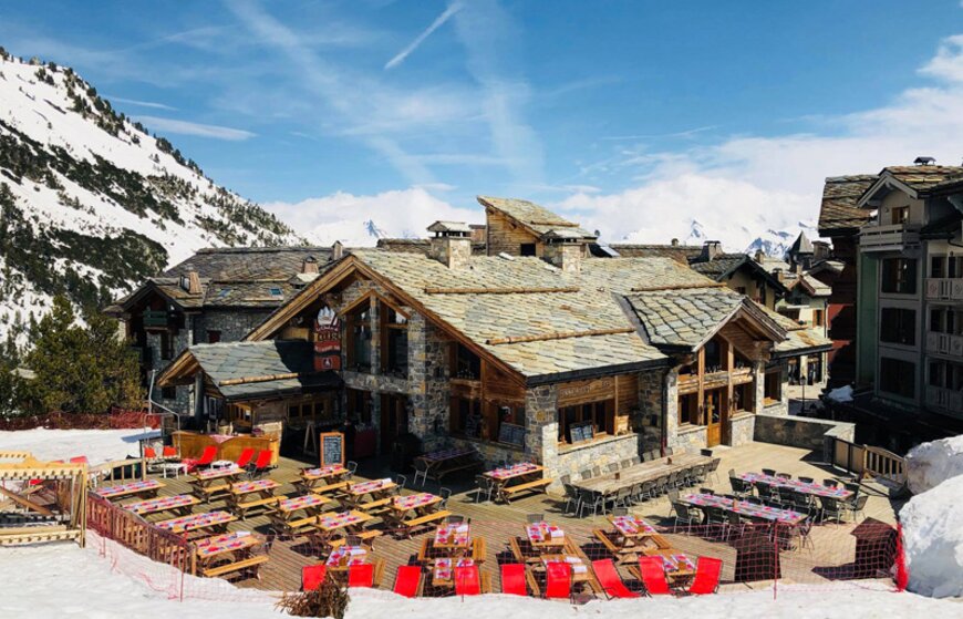 Traditional stone chalet restaurant with large terrace