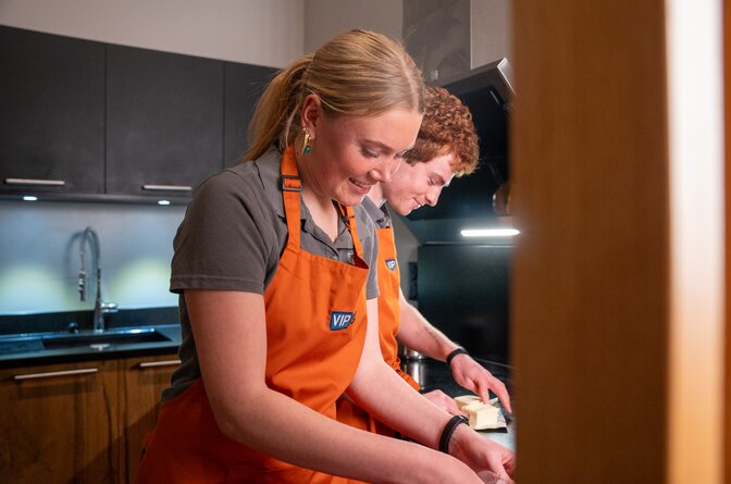 ski chalet hosts in kitchen