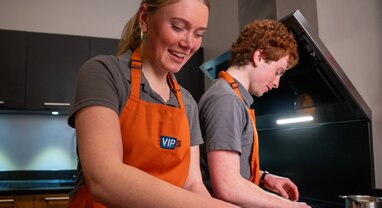 vip ski chalet hosts preparing food