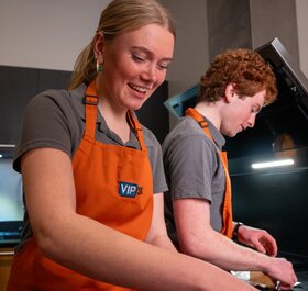 vip ski chalet hosts preparing food