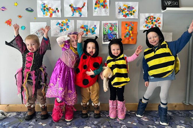 5 children enjoying childcare on ski holiday