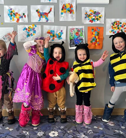 5 children enjoying childcare on ski holiday