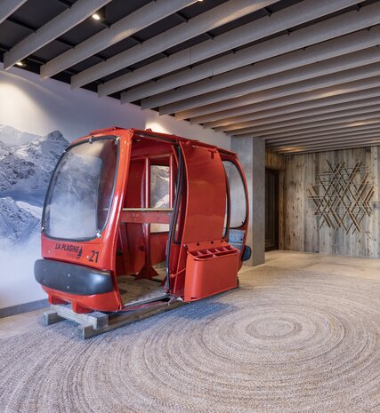 Red La Plagne gondola in reception of the Graciosa