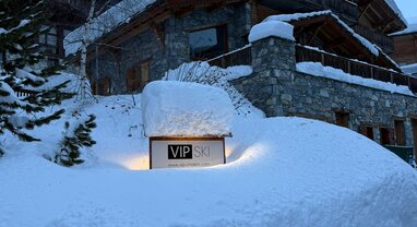 VIP Ski sign covered in deep snow in Val d'Isere