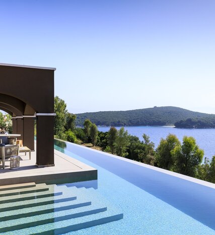 Contemporary villa with large infinity pool above the sea