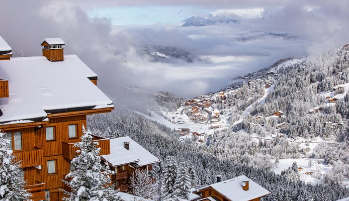 Meribel centre with chalets covered in snow 