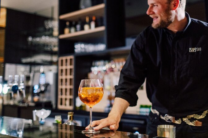 Barman at Bear Lodge serving cocktail