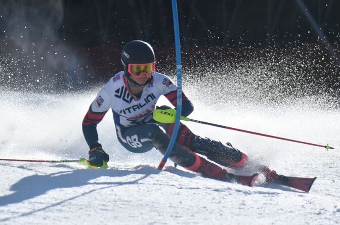 GB skier Max Laughland skiing around slalom pole